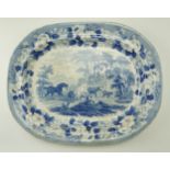 An early 19th Century transfer decorated blue and white earthenware ashet, bearing a bucolic scene