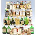 A large quantity of whisky, rum and other miniatures, including Glenfiddich, Southern Comfort, Black