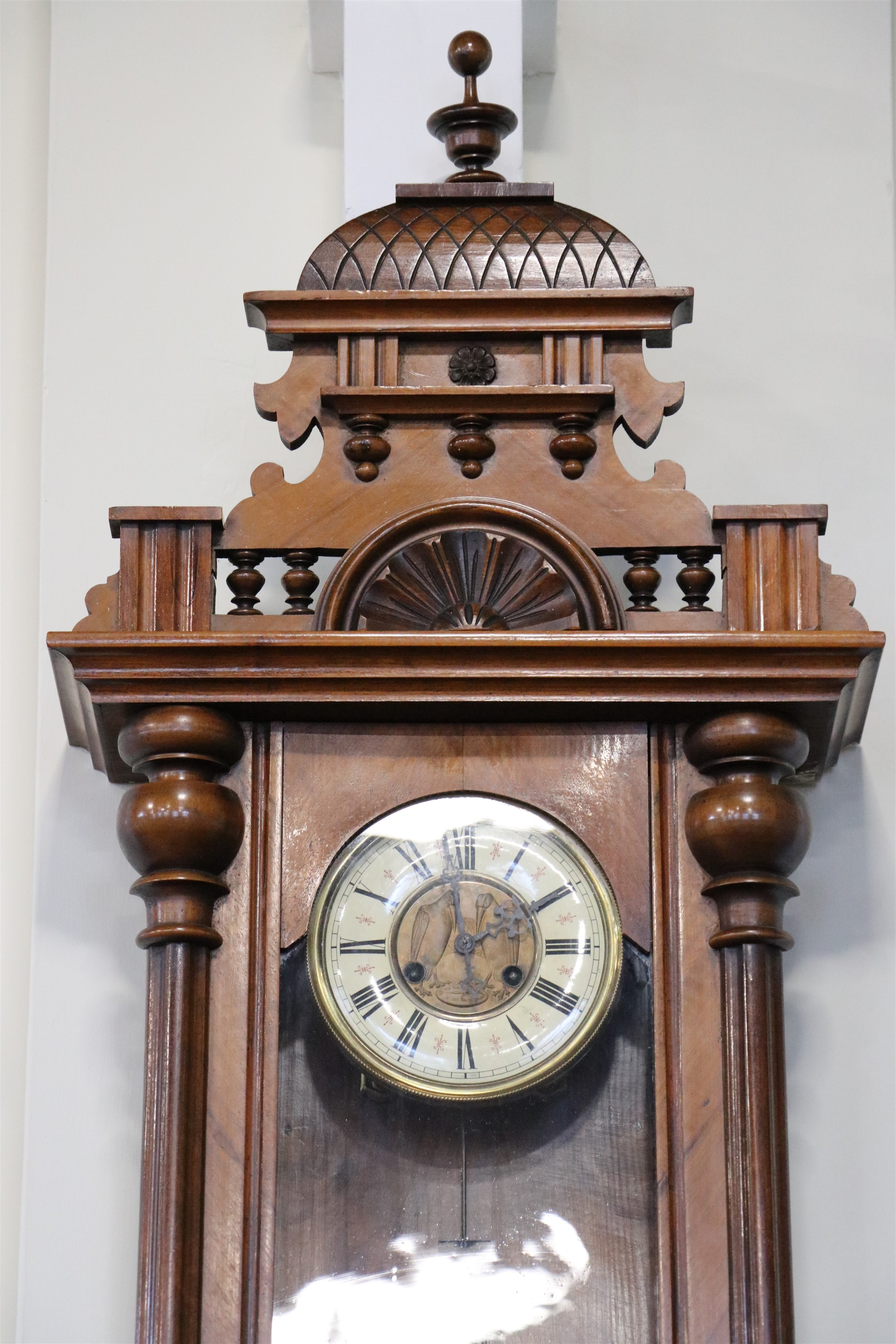 A 1920s walnut Vienna wall clock, having a two train spring movement striking on a gong, 48 x 18 x - Image 2 of 4