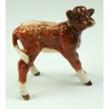 A Beswick shorthorn calf, model number 1406c, 7 cm high