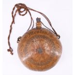 A 19th Century calabash gourd / water vessel, the exterior engraved and coloured in depiction of