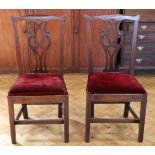 A pair of George III fret back dining chairs, having upholstered drop-in seats, 98 cm high