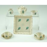 A W H Goss gilt and floral decorated miniature tea set, dish 7 cm