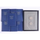 Seven decimal coin sets together with two framed fifty pence pieces