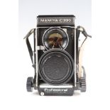 A Mamiya C330 Professional film camera, mounted with Mamiya-Sekor 1:28, f = 80 mm lenses, in leather