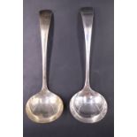 A pair of silver old English pattern sauce ladles, Sheffield, 1952, 58 g gross, 13 cm