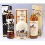The Famous Grouse Highland Decanter of whisky, together with a boxed 700 ml bottle and a boxed 700