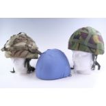 Three British military Mk 6 helmets and covers