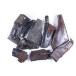 A quantity of pistol holsters