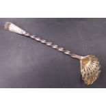 A Victorian silver sugar sifter spoon, having a twisted stem and pierced shell form bowl, London,