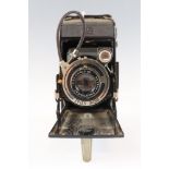 A Zeiss Ikon folding roll-film camera