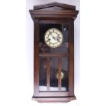 A Junghans oak cased wall clock, having a two train movement striking on a gong, circa 1920s, (one