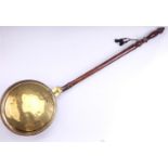 A Victorian brass and copper long handled bed warmer, 108 cm