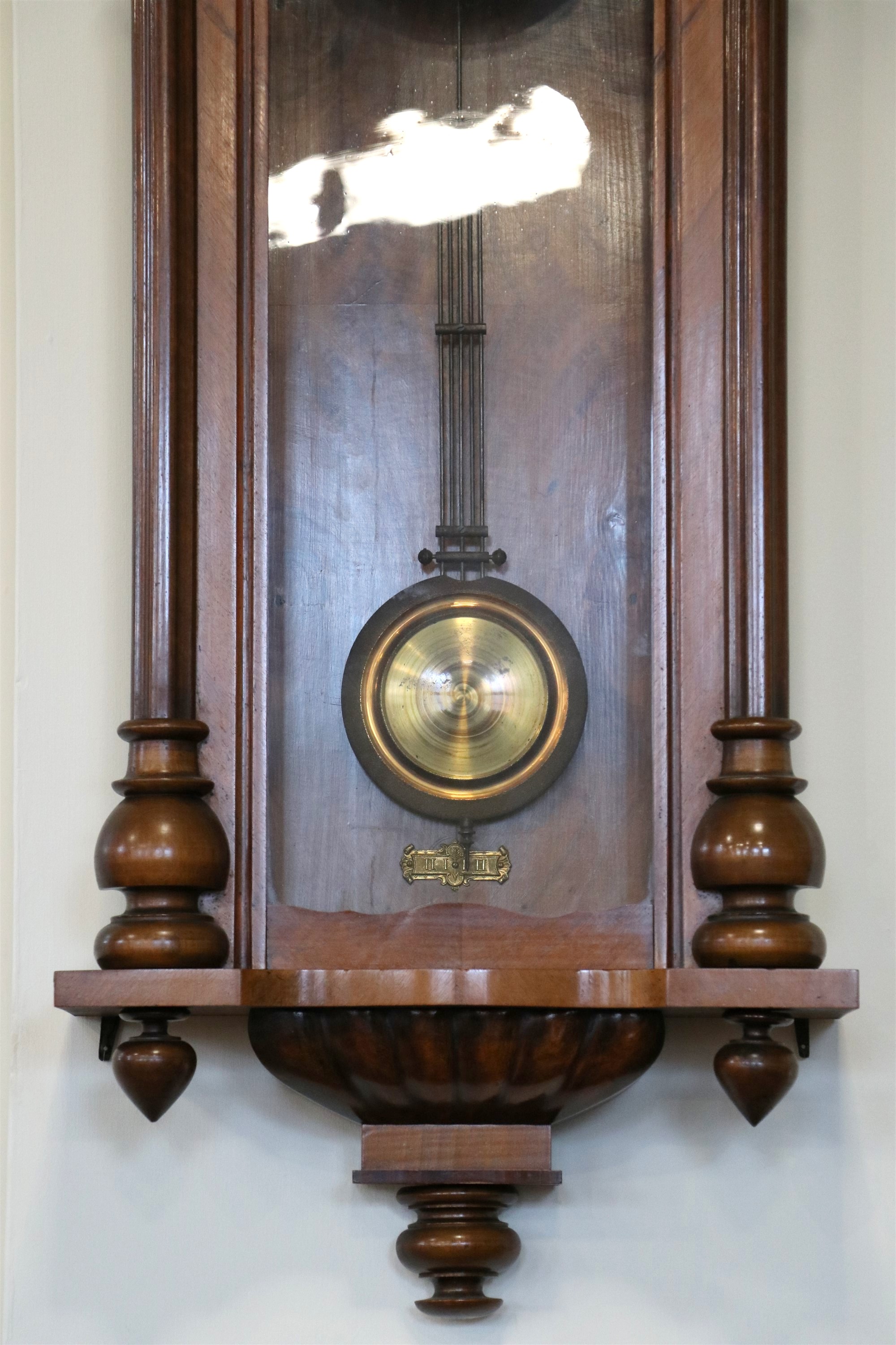 A 1920s walnut Vienna wall clock, having a two train spring movement striking on a gong, 48 x 18 x - Image 3 of 4