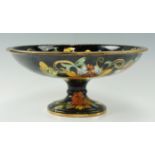 A mid-to-late 20th Century Belgian polychrome floral decorated ceramic centrepiece bowl by H Bequet,