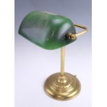 A brass and green glass banker's lamp, 40 cm