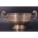 A diminutive late Victorian silver rose bowl, of plain form having fluted bands and scroll