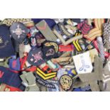 A large quantity of military cloth insignia