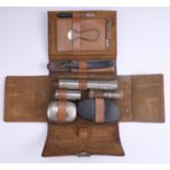 A vintage leather cased gentleman's travelling dressing kit, 21 x 16 x 6.5 cm