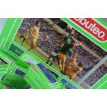 A Subbuteo tabletop football game together with a quantity of boxed accessories, including a