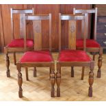A set of four 1930s oak dining chairs, 95 cm high