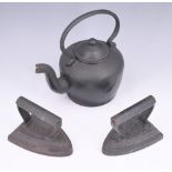 A cast iron kettle, 24 cm, together with two flat irons
