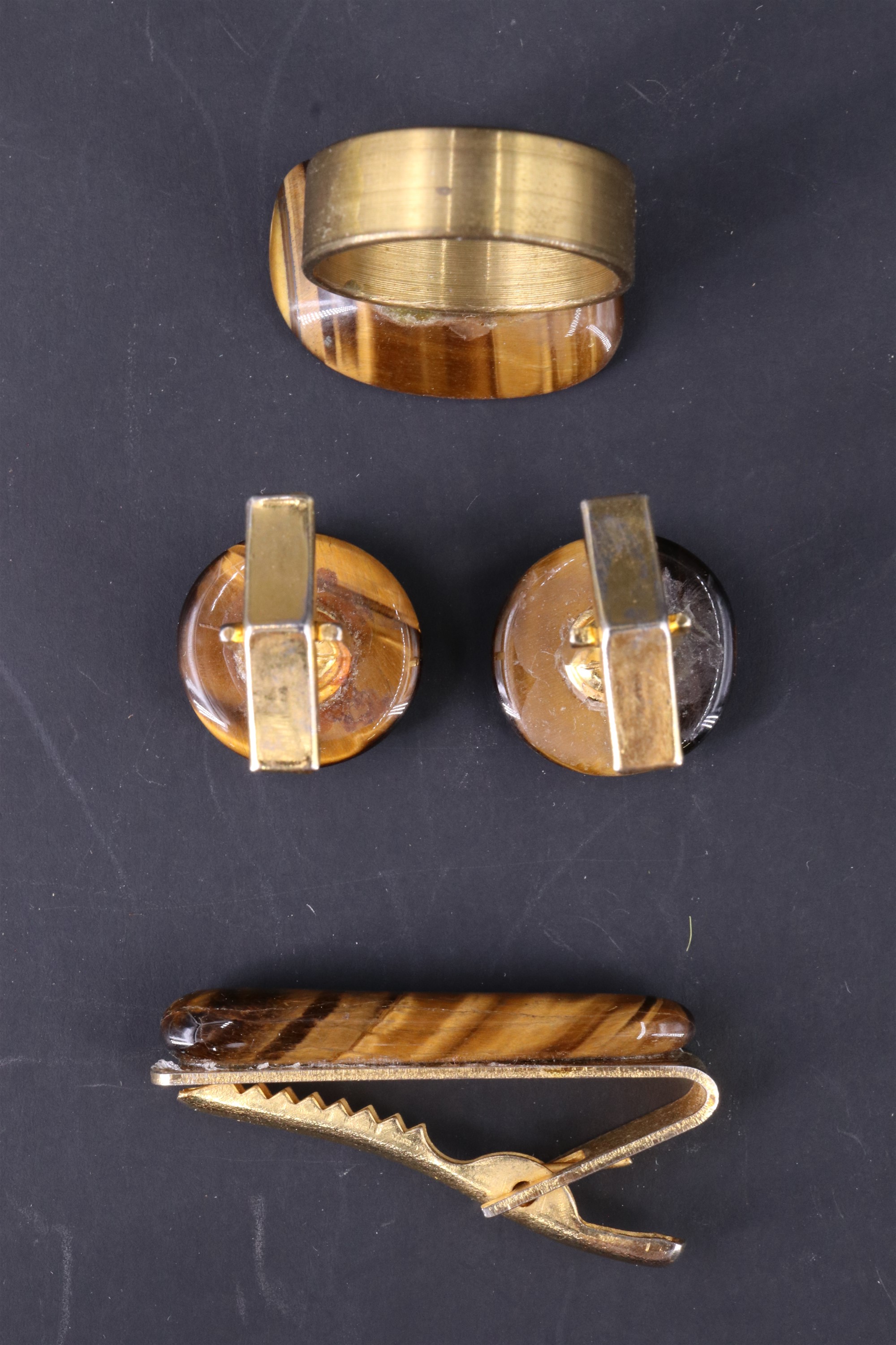 Four items of late 20th Century tiger's eye and gilt metal jewellery, including cufflinks and - Image 3 of 3