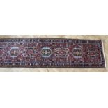 An Iranian Afshar style hand-knotted wool-pile runner, 290 x 75 cm