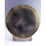 A 1930s circular brass framed bevel edge mirror, 63 cm diameter