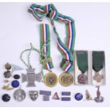 Sundry medals and badges including a 1950 Bombay Olympic Games medallion