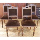 A set of four Edwardian oak dining chairs, 97 cm high