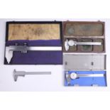 A Swiss cased vernier gauge 29 cm / 12", a Swiss dial gauge, and Mitutoyo vernier and dial gauges