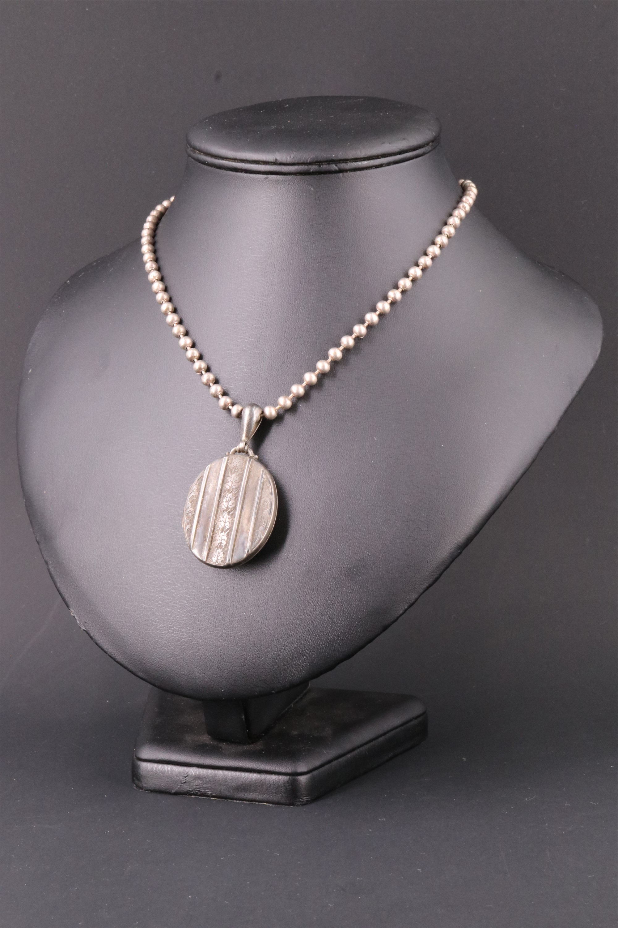 A Victorian white metal pendant double locket and bead neck chain, together with an Essex crystal - Image 3 of 6