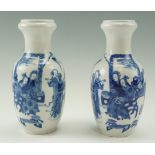 A pair of Chinese porcelain vases, each oviform with waisted neck and inverted rim, bearing handed