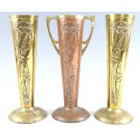 A pair of Art Nouveau brass vases by Beldray, bearing embossed floral decoration, together with a
