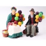 Two Royal Doulton figurines, The Old Balloon Seller and The Balloon Man, tallest 20 cm