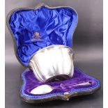A cased Edwardian silver christening bowl and spoon, Atkin Brothers, Sheffield, 1904, 178 g gross,