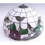 A Tiffany style leaded glass floral decorated lamp shade, 41 x 25 cm
