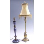 Two late 20th Century table lamps, both having painted and gilt finishes, 54 cm and 65 cm to tops of