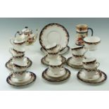 An early 20th Century Crown Chelsea tea set together with a Burleigh Ware Japonica teapot and a jug,