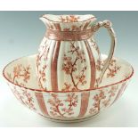 A Victorian "Cherry" wash bowl and jug