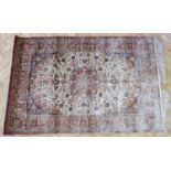 A Chinese silk blend rug, in a Turkish Hereke style, 185 x 121 cm