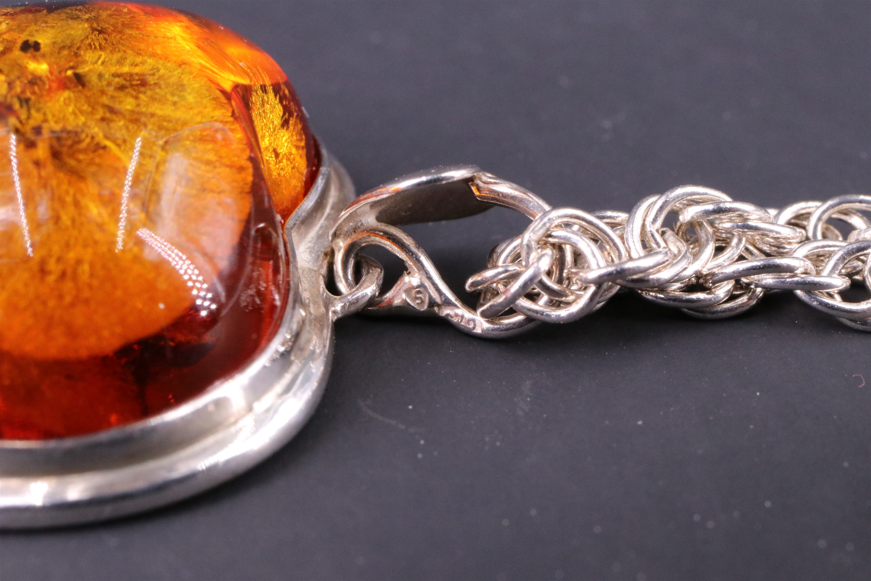 A contemporary sun spangled amber pendant necklace, being a 25 x 25 mm heart shaped amber cabochon - Image 4 of 8