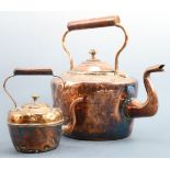 A Victorian copper kettle together with a miniature copper kettle, former 26 cm tall
