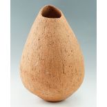 A large late 20th Century studio pottery terracotta vase, of ovoid form having a rough