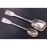 A William IV silver long handled fiddle pattern caddy spoon and matching condiment spoon, London,