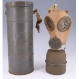 A French army Model 1938 gas mask and tin