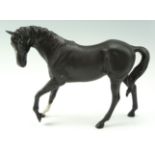 A Beswick horse, Black Beauty, 18 cm