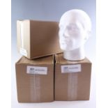 Three new-old-stock polystyrene display mannequin heads, boxed