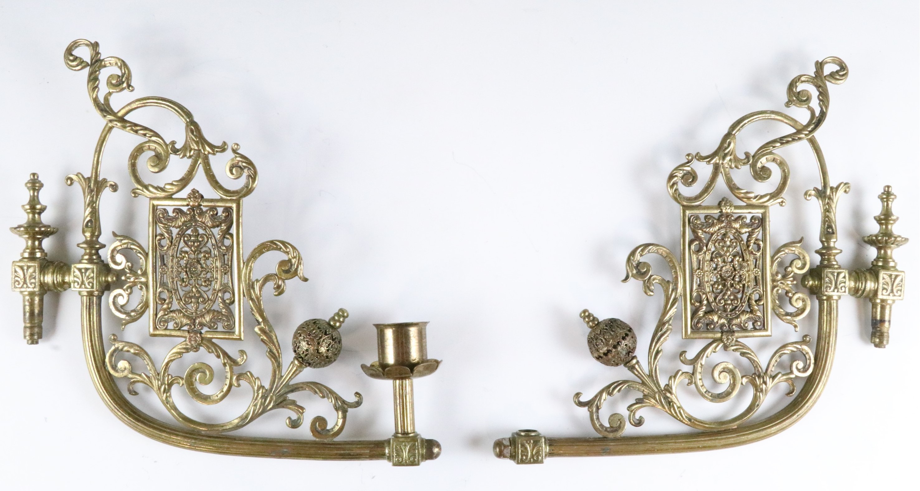 A Victorian cast brass trivet, having armorial decoration, a pair of ornate part candle holder - Image 2 of 6